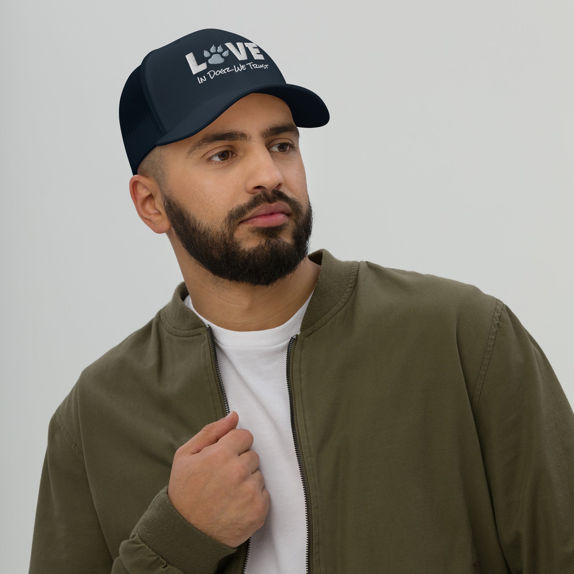 For the LOVE of Dogz - Embroidered Trucker Hat - Navy with White Design - In Dogz We Trust - Male Model